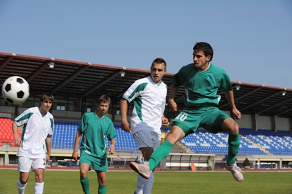 Men playing soccer