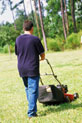 Man Mowing Lawn