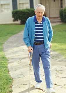 Elderly Man Walking with Cane